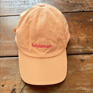 Lululemon Light Orange Cap with Pink embroidery - Size S/M